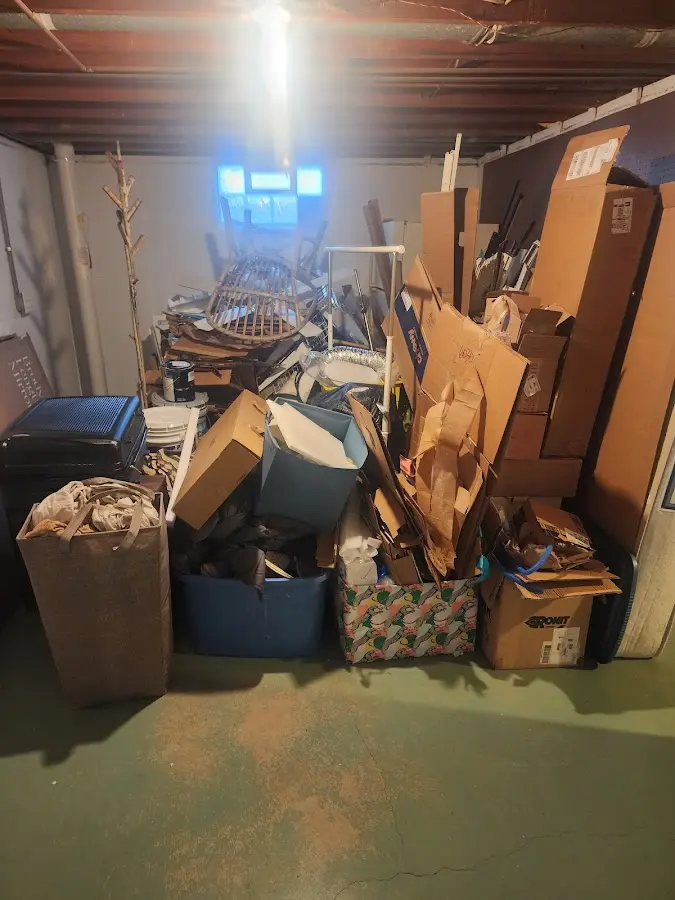 Roll-off dumpster container at job site for Yard Waste Dumpster Rental in Cody